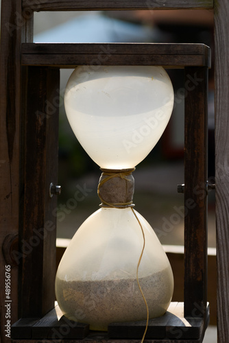 hourglass on old background