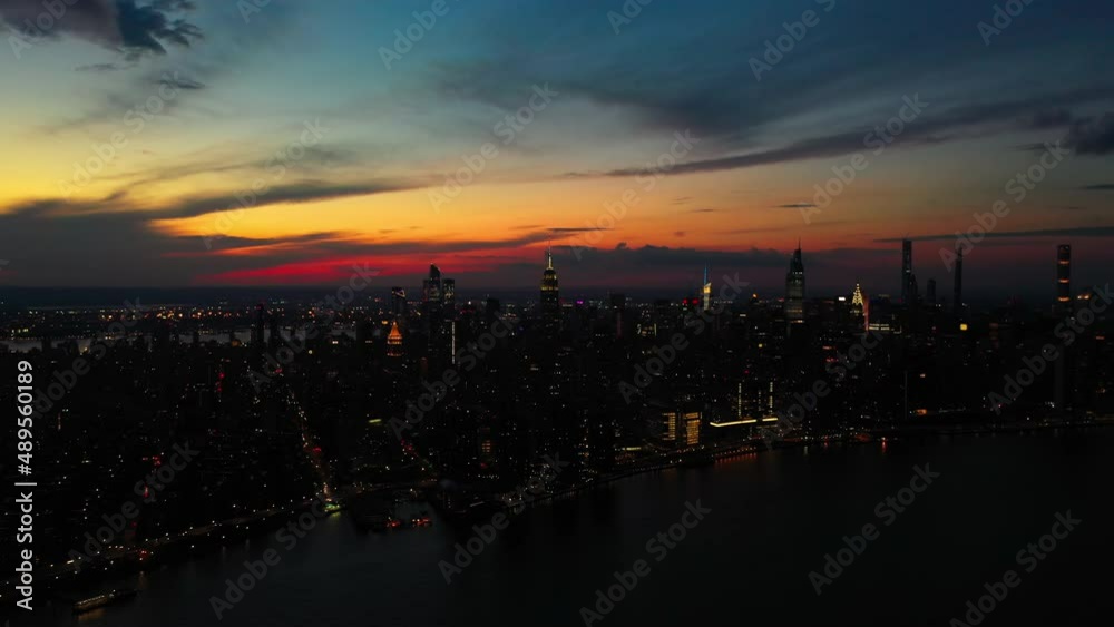 Drone flying over Manhattan against sky Drone flying over Manhattan against sky