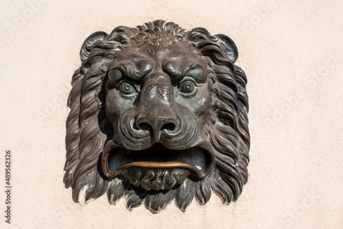 Beutiful lions head letter box in a Spanish town.
