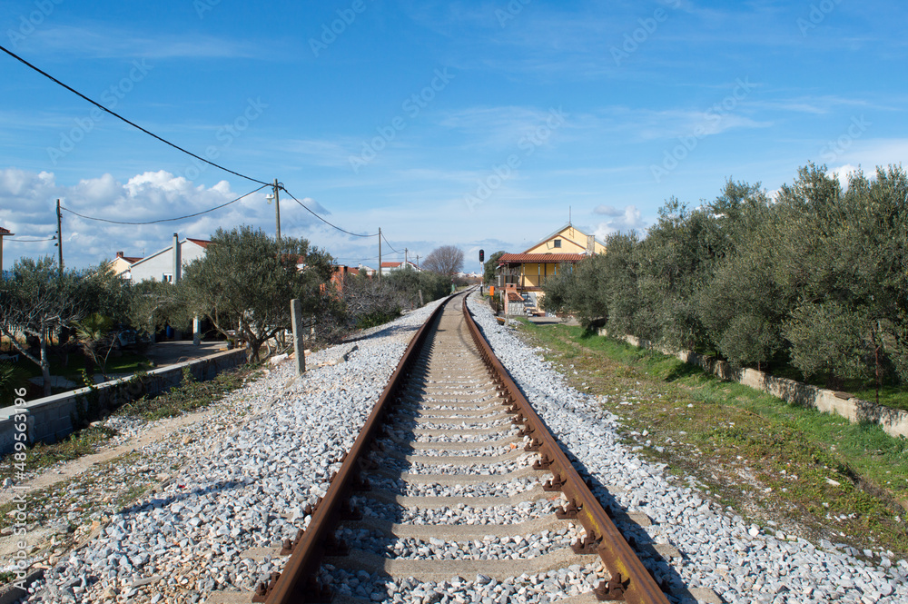 Empty railroad through a small town, in the countryside, Bibinje, Croatia