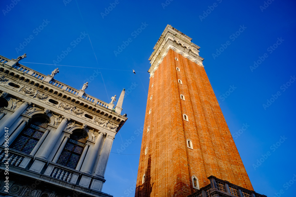 clocktower campanile in venice, italy in the evening light