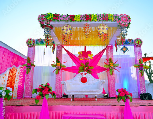 Decorated stage with no one in traditional Indian wedding