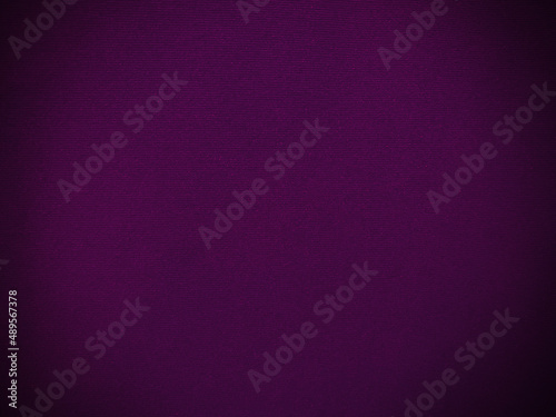 Purple velvet fabric texture used as background. Empty purple fabric background of soft and smooth textile material. There is space for text. 