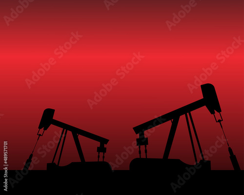 Oil rig silhouettes and orange sky, vector illustration