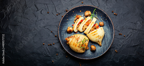 Foto Grilled squid with mushroom, space for text
