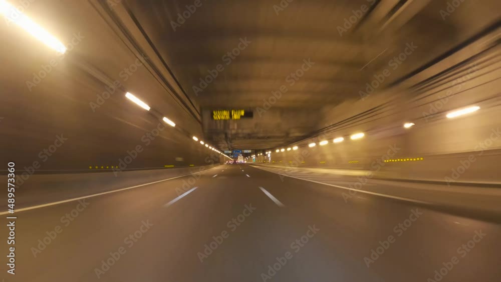 Point of view hyper-lapse time-lapse from a car driving in a tunnel and Paris streets at night, Paris Skyline view Point of view hyper-lapse time-lapse from a car driving in a tunnel and Paris streets at night, Paris Skyline view