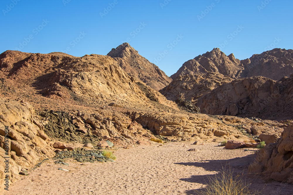 Colored canyon with red sandstone and limestone rocks, Nabq protected area, Sharm El Sheikh, Sinai peninsula, Egypt, North Africa. Egyptian safari