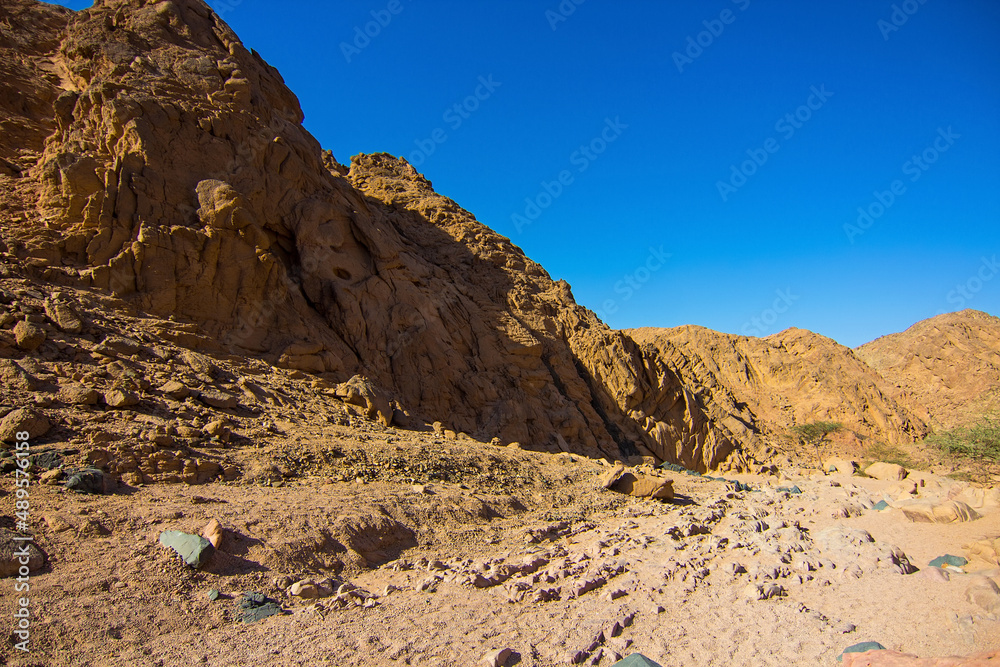 Colored canyon with red limestone rocks, Nabq protected area, Sharm El Sheikh, Sinai peninsula, Egypt, North Africa. Egyptian safari	