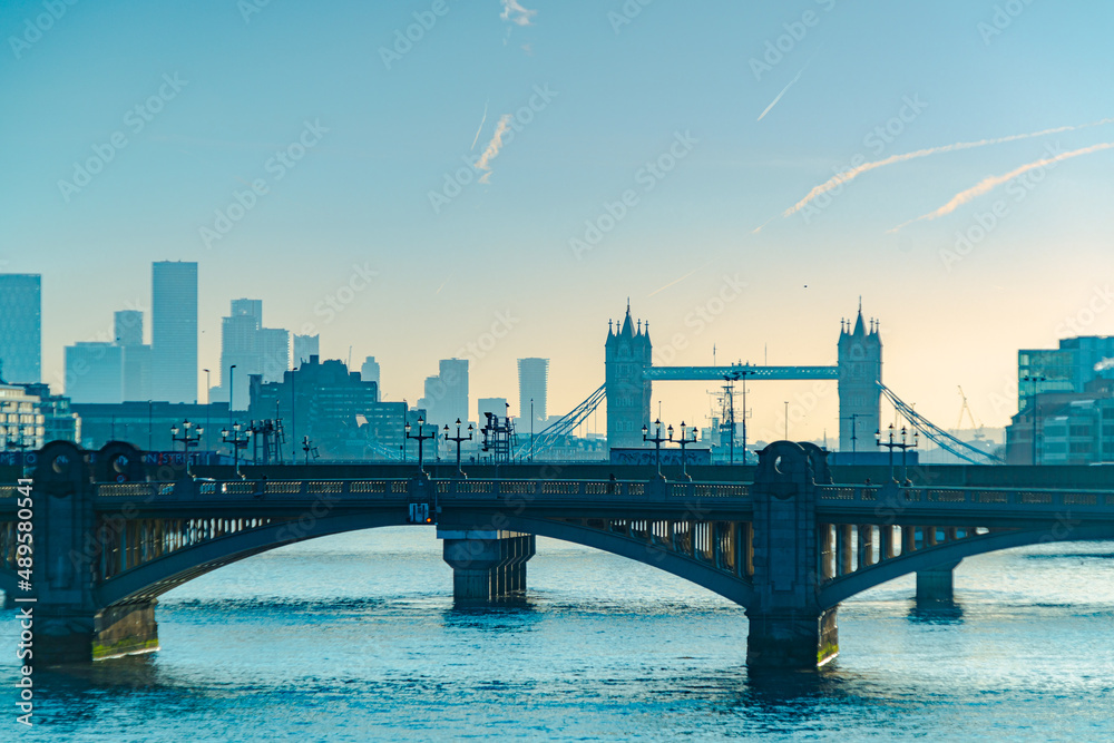 Fototapeta premium Looking along the Thames in London towards Tower Bridge at Sunrise