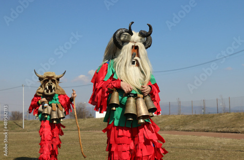 Masquerade festival in Elin Pelin, Bulgaria. People with mask called Kukeri dance and perform to scare the evil spirits. 