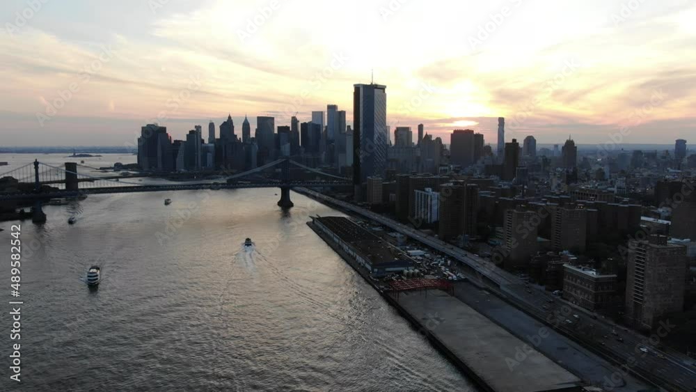 Drone flying over Manhattan against sky Drone flying over Manhattan against sky