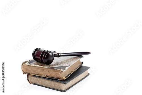 Law concept - law book with a wooden judge's gavel on table. Copy space for text