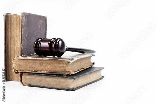 Law concept - law book with a wooden judge's gavel on table. Copy space for text