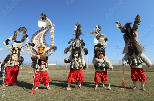 Masquerade festival in Elin Pelin, Bulgaria. People with mask called Kukeri dance and perform to scare the evil spirits. 