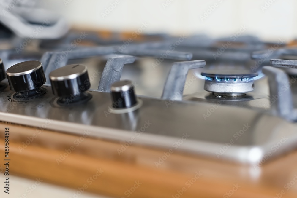 detail gas stove, burning flame, energy source, heat, cooking, flame, energy prices, metal, steel, iron, wood, materials detail gas stove, burning flame, energy source, heat, cooking, flame, energy prices, metal, steel, iron, wood, materials