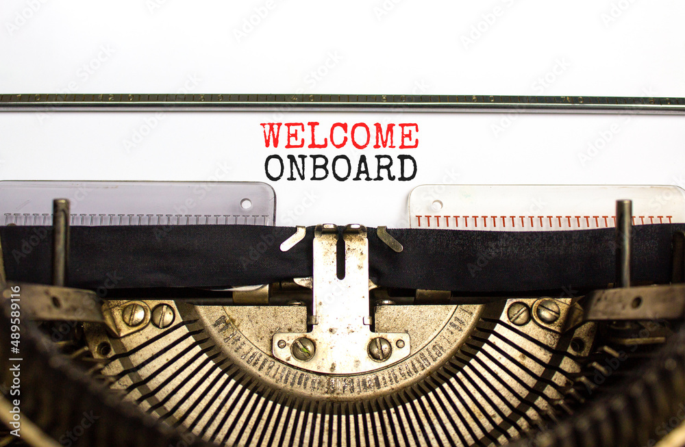 Welcome onboard and support symbol. Concept words Welcome onboard on white paper typed on retro typewriter. Beautiful white background. Copy space. Business and Welcome onboard concept.