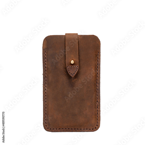 New black genuine leather wallet with banknotes and credit card inside isolated on white background.