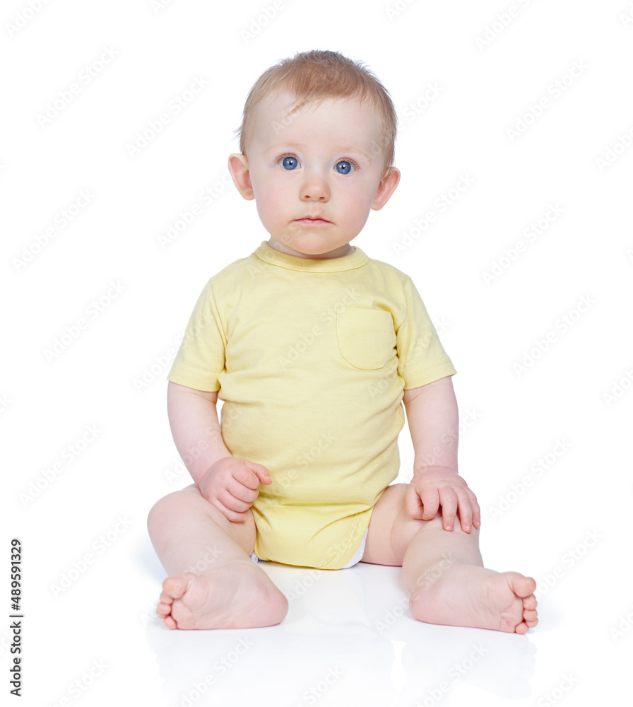 He finds you very interesting. A cute baby boy against a white background. He finds you very interesting. A cute baby boy against a white background.