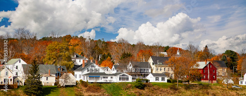 Waterfront homes surrounded by fall color in Wiscasset Maine,