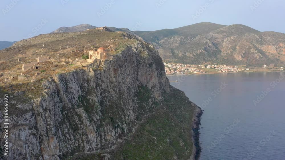 Panorama of Church of St. Sophia in medieval castle town of Monemvasia in Lakonia at sunrise, Peloponnese, Greece.
Panorama of Church of St. Sophia in medieval castle town of Monemvasia in Lakonia at sunrise, Peloponnese, Greece.