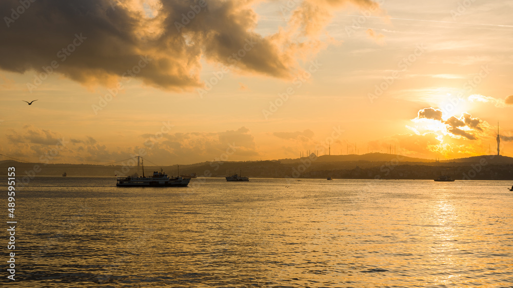 Bosphorus on an autumn morning. City line ferries at sunrise. Istanbul -Turkey 