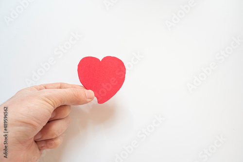 woman holding red heart. Organ donation and insurance concept. World heart health concept. World organ donation day. Concept of healthy heart for healthy life. selective focus