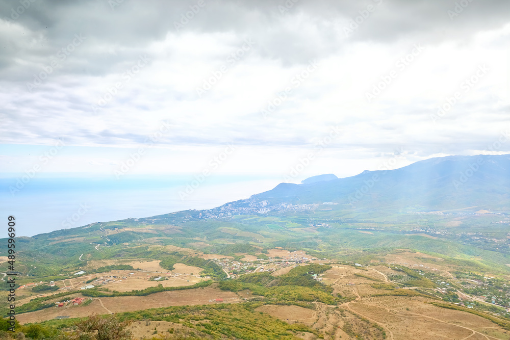 Naklejka premium View of the village of Radiant and Alushta from the mountains of South Demerdzhi. Crimea valley of ghosts.