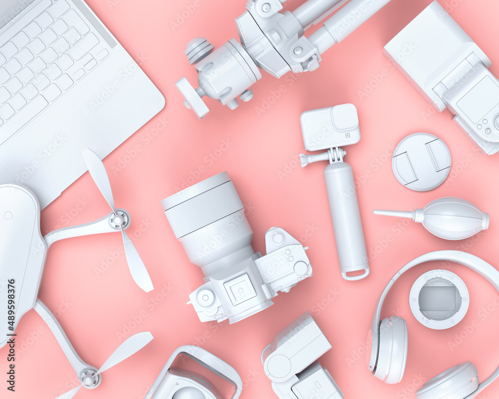 Top view of designer workspace and photography gear on black table background Top view of designer workspace and photography gear on black table background