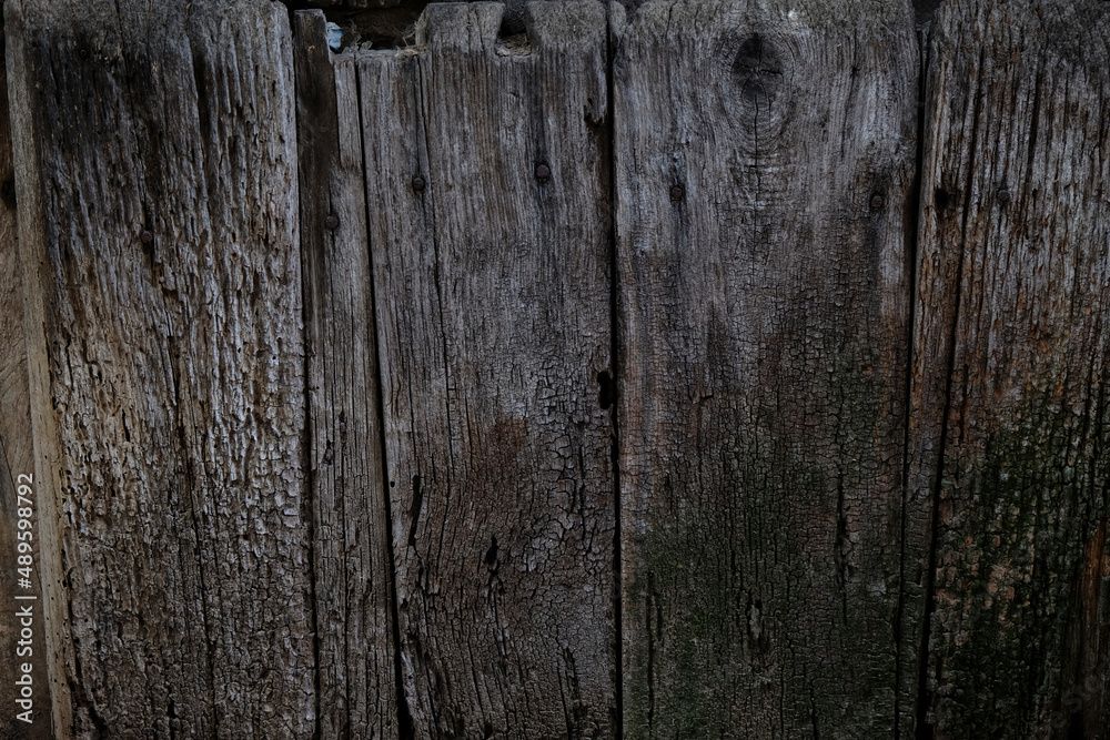 Wooden boards deteriorated by the passage of time