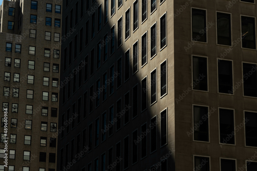 Close up architecture city bright day with light and shadow, abstract look, windows and architecture