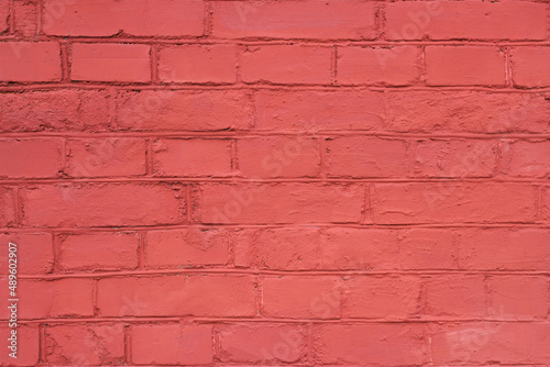 textured brick wall painted in red color