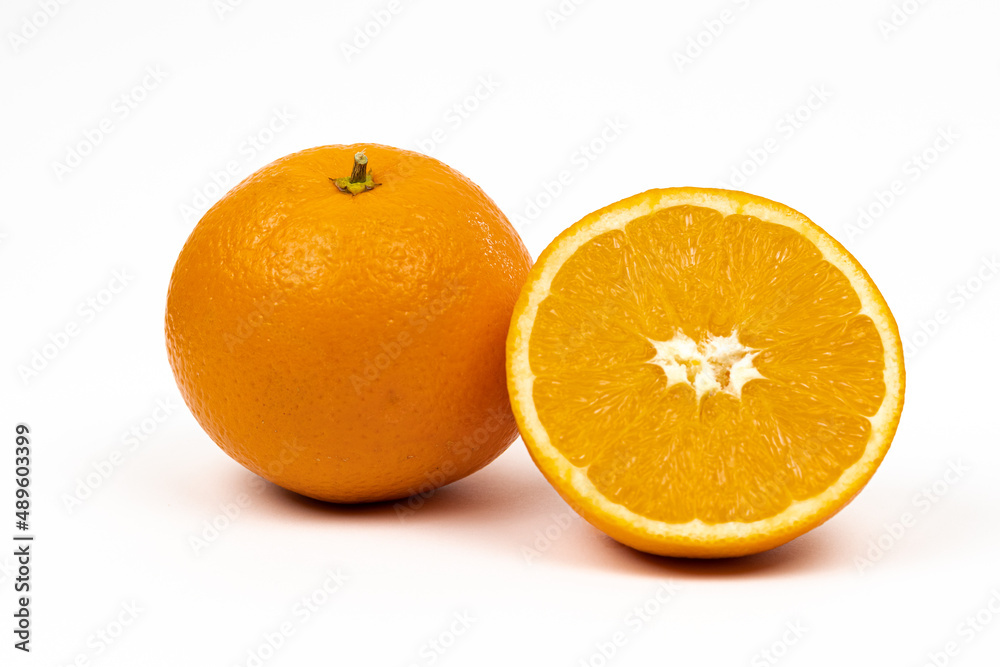 Ripe oranges isolated cut in half on white background Ripe oranges isolated cut in half on white background