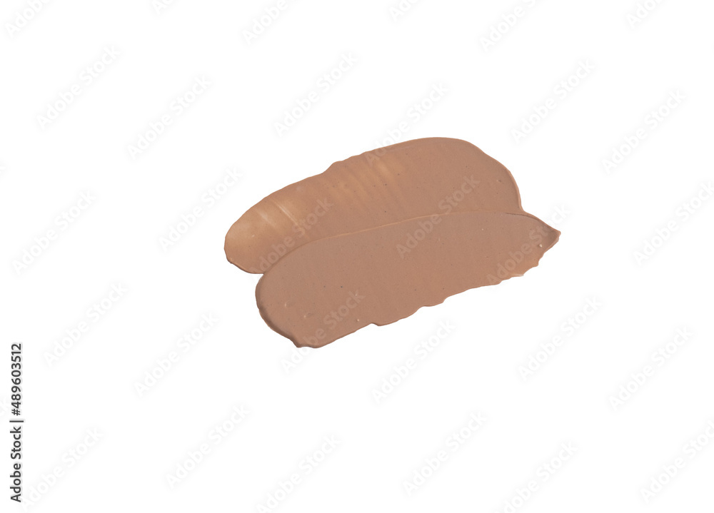 close-up smear of foundation, red clay masks on a white background close-up smear of foundation, red clay masks on a white background