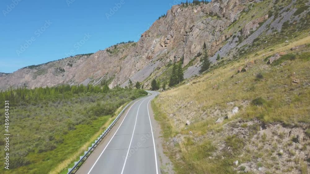 cinematic flight over the highway in the Altai mountains. 4K cinematic flight over the highway in the Altai mountains. 4K