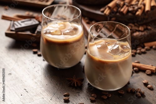 Cream and coffee cocktail in glasses with ice.
