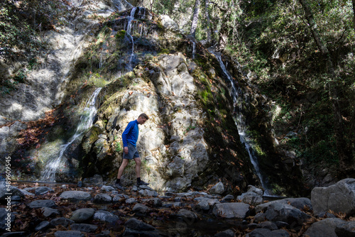 tourist at Chantara Waterfall in Troodos Mountains in Cyprus photo