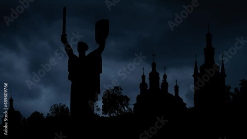 Lightning thunderstorm flash over Mother Land monument and Pechersk Lavra in Kiev, Ukraine photo