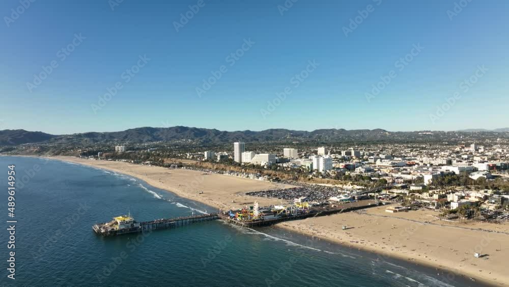 Aerial view of Santa Monica State Beach, Santa Monica Pier and the mountains of Top Aerial View. Aerial view of Santa Monica State Beach, Santa Monica Pier and the mountains of Top Aerial View.