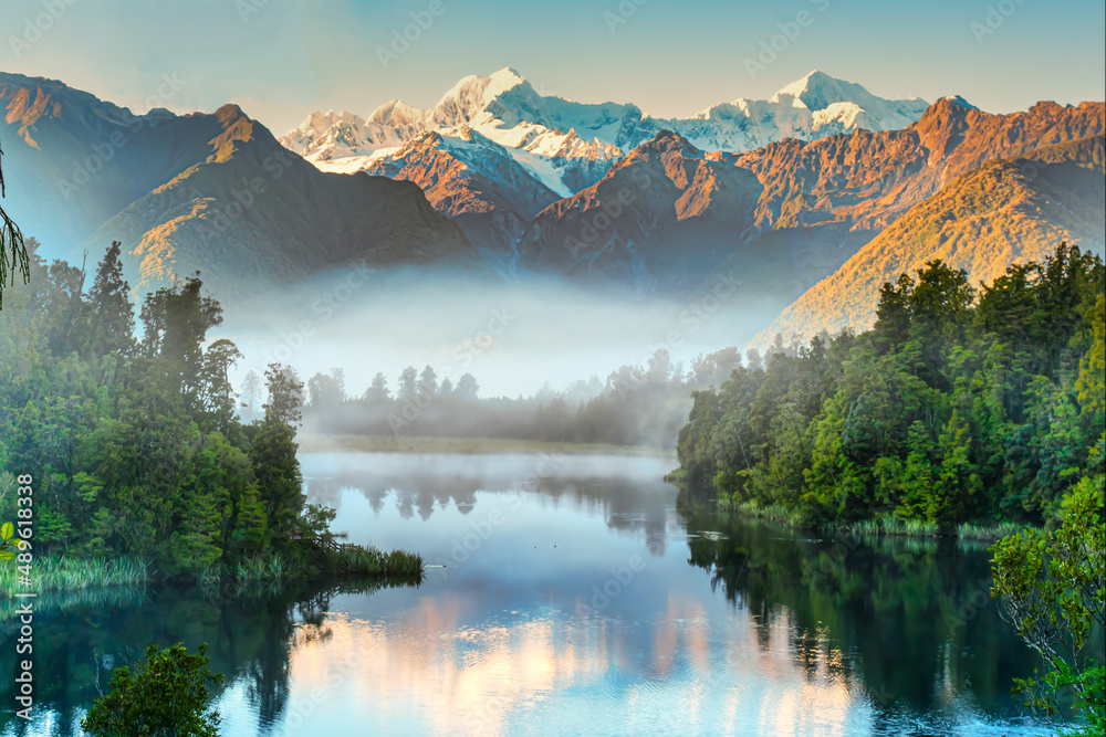 Early morning fog and mist at Lake Matheson but with enough light to capture the reflections of the Southern Alps