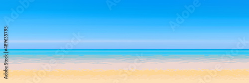 Panoramic view of the sandy beach of the sea, blurred summer background. Blue sky, sea and yellow sand.