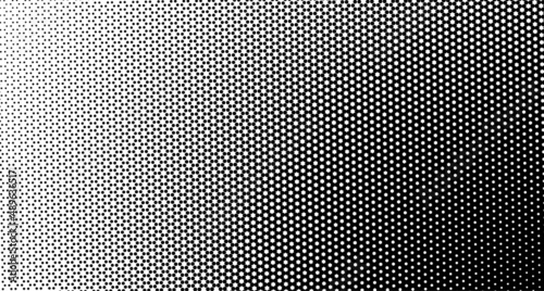 The halftone texture is black and white. Monochrome abstract, chaotic texture. Waves of dots on a white background, abstract halftone