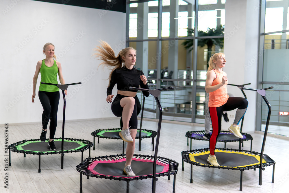 Trampoline for fitness girls are engaged in professional sports, the  concept of a healthy lifestyle jumping trampoline woman fitness sport  training, from workout active in lifestyle from body trainer Photos | Adobe
