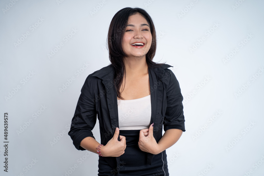 young asian woman with long hair smiling while standing young asian woman with long hair smiling while standing