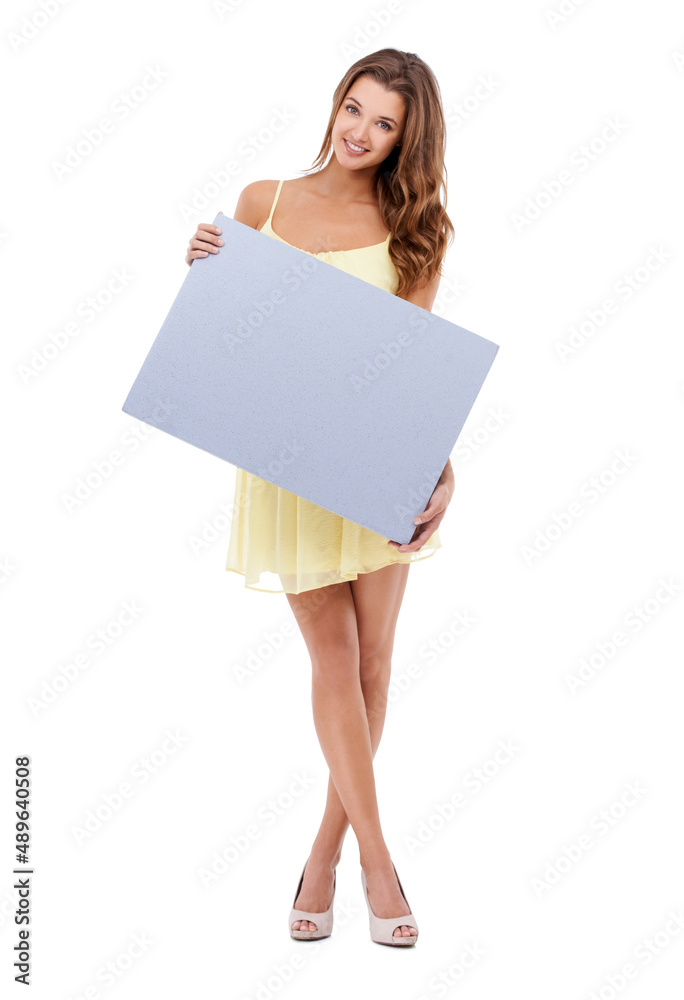 Im happy to be presenting today. Attractive young woman standing and holding a board. Im happy to be presenting today. Attractive young woman standing and holding a board.