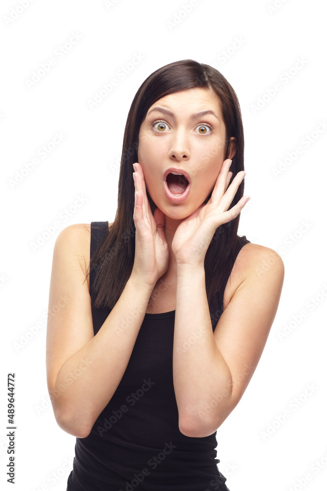 Shock Horror. A shocked young woman isolated on a white background. Shock Horror. A shocked young woman isolated on a white background.