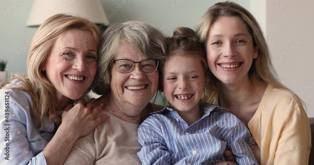 60s woman her pensioner mum, grown-up daughter, granddaughter close up portrait. Multigenerational family smile look at camera. Medical insurance, dental service for citizen and younger, love concept 60s woman her pensioner mum, grown-up daughter, granddaughter close up portrait. Multigenerational family smile look at camera. Medical insurance, dental service for citizen and younger, love concept