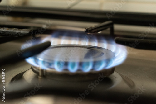 Burning gas, gas stove burning, hob in the kitchen. Expensive gas