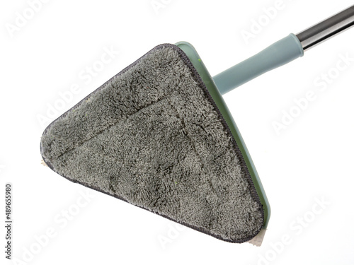 The mop is triangular with interchangeable nozzles.