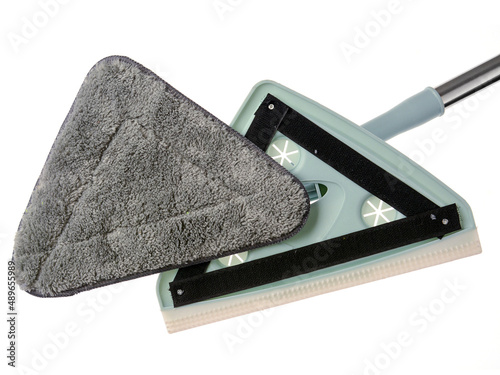 The mop is triangular with interchangeable nozzles.