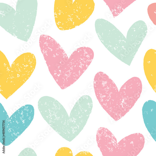 Seamless background with hearts in beautiful colors. Dry brush. Monochrome.